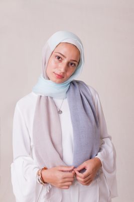 Hijabi model in EMMA Scarf SOul Surfer staring at camera