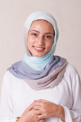 hijabi model in EMMA Scarf Soul surfer smiling at camera