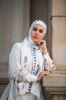 EMMA scarf Love Me White ,a white hijab with blue embroidery accents of pashmina and hearts.