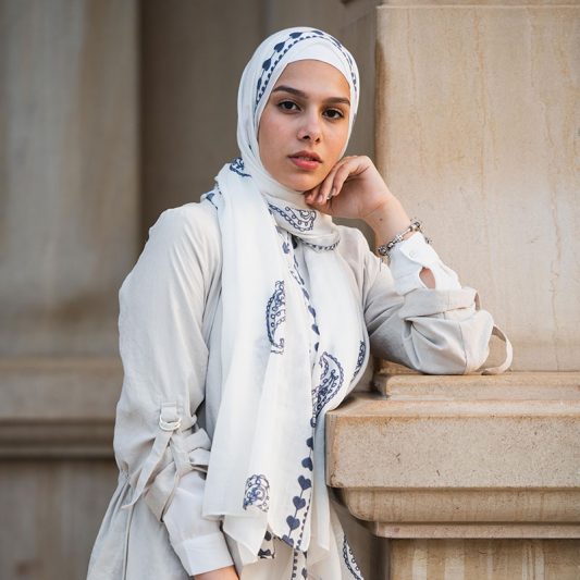 EMMA scarf Love Me White ,a white hijab with blue embroidery accents of pashmina and hearts.