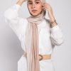 hijabi model in EMMA Scarf Caramelized sugar looking at camera