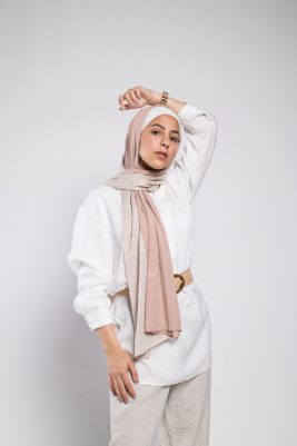 hijabi model in EMMA scarf Caramelized sugar staring at camera