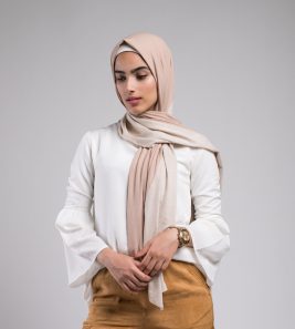 hijabi model in EMMA Scarf Caramelized sugar looking at the floor