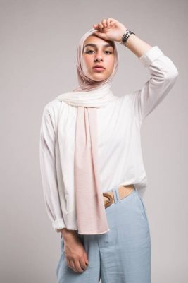 hijabi model in EMMA Scarf pink sugar staring at camera