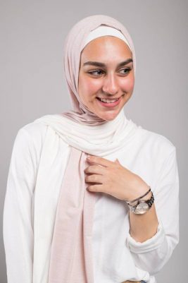 close up of hijabi model in EMMA Scarf Pink sugar smiling to the side