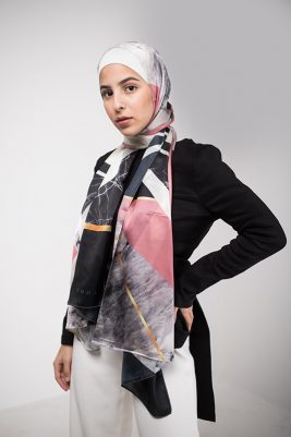 Hijabi model in EMMA Scarf Retro Classic in a black top and white pants