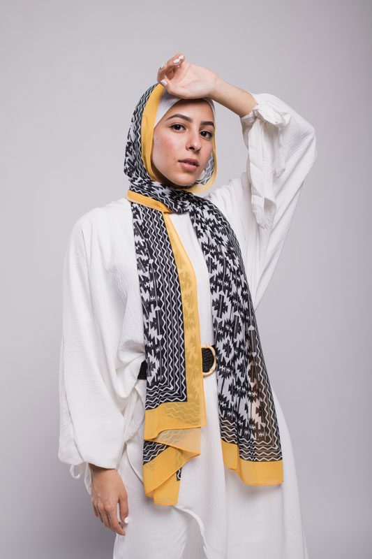 Hijabi model in EMMA Scarf Aztec sunshine , with yellow border