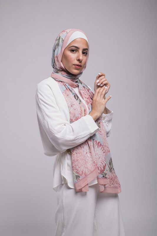 Hijabi model in EMMA Scarf Honey Blooms Chiffon hiding her hands together close to her chest
