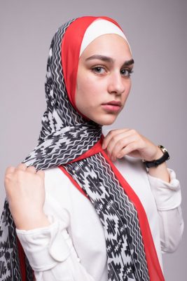 hijabi model in EMMA Scarf Aztec Rouge looking at the camera from the side