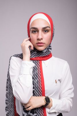 Hijabi Model in EMMA Scarf Aztec Rouge staring at the camera