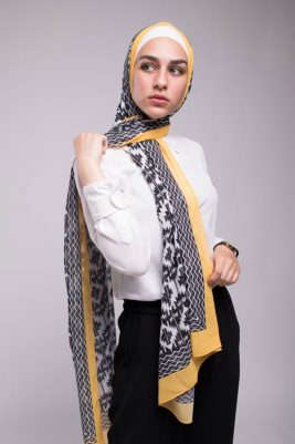 EMMA Scarf Aztec sunshine on hijabi model looking to her side