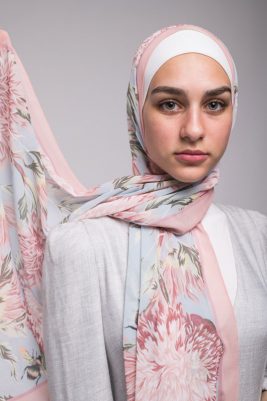 Green eyed hijabi model in EMMA Scarf Honey Blooms chiffon with hijab flying in the back