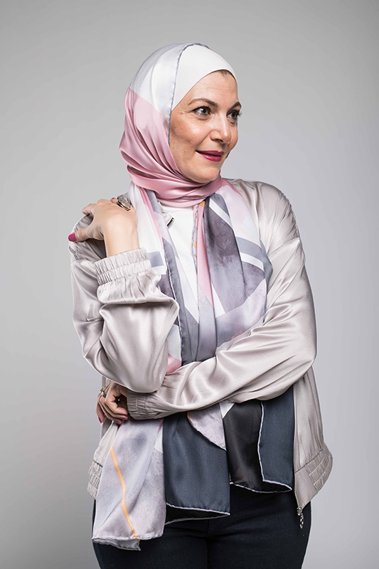 Hijabi Woman in Satin Jacket looking afar in EMMA Scarf Retro Classic for EMMA style edit