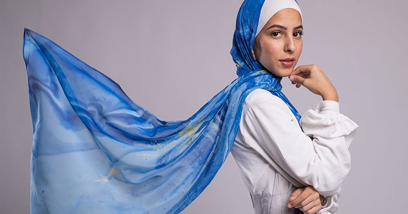 Hijabi model wearing flowing EMMA scarf Starry Night inspired by Van gogh