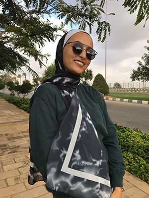 EMMA customer posing in her EMMA Hijab Black Marble