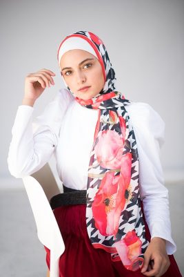 EMMA Angel Nehal posing in Dolce Vita scarf