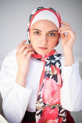 EMMA Angel Nehal posing in Dolce Vita scarf