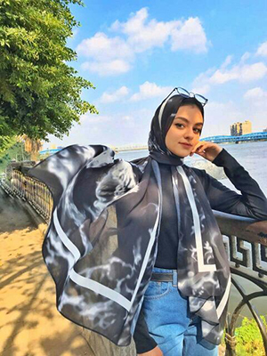 EMMA Customer hijab flying in her EMMA hijab Black Marble