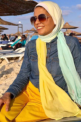 EMMA customer wearing her Kiwi Zest hijab on the beach