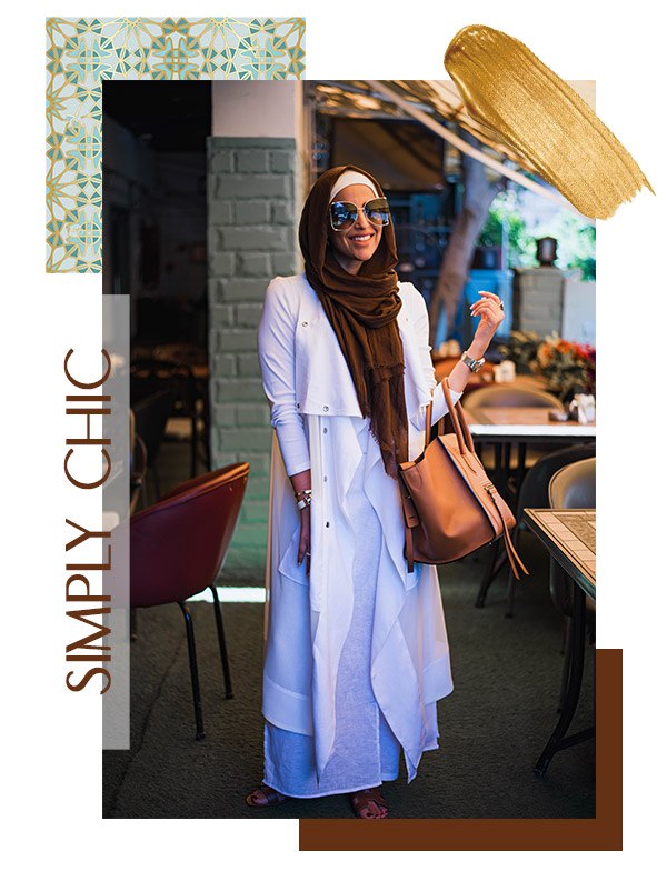 Hijabi woman styling EMMA Scarf Basic Dark chocolate in ann all white outfit ,smiling in her glasses