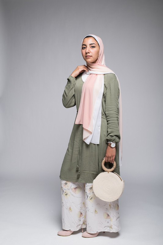 Hijbai model in EMMA Scarf Peach sorbet , a green long sleeve dress and white flowers pants