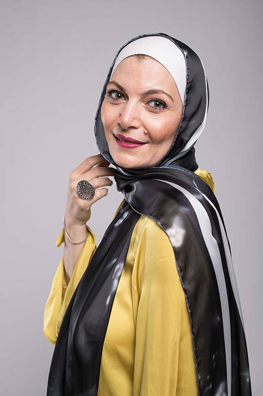 Close up of a hijabi woman in EMMA scarf Black marble satin