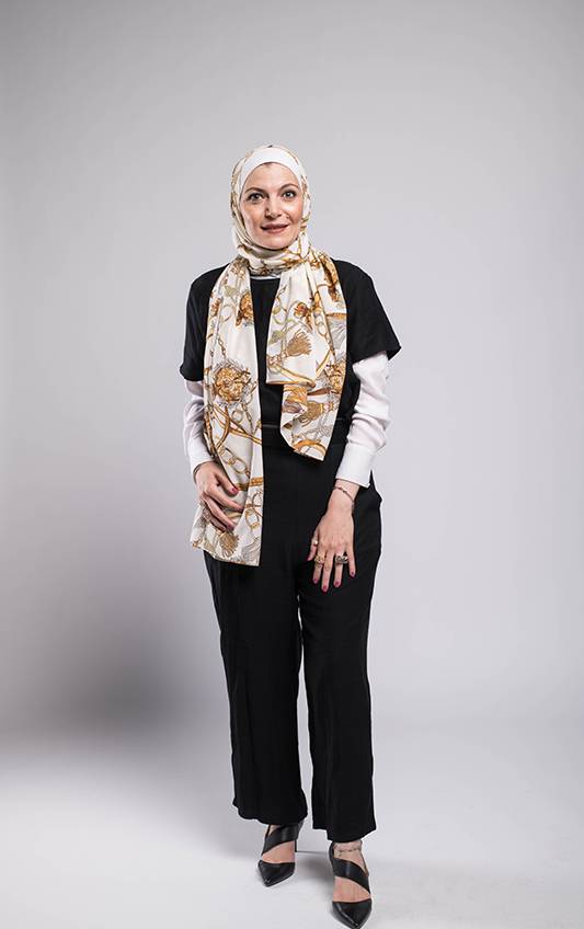 full body of a hijabi woman in EMMA Scarf Chain's D'ior