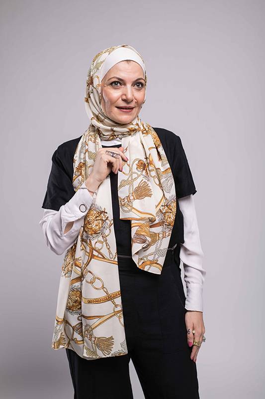 Portrait of a hijabi woman in EMMA Scarf Chain's D'ior
