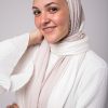 Hijabi model cool skin tone in EMMA scarf Pink Sugar smiling at camera