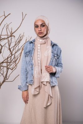 hijabi model in EMMA Scarf love me nude staring at camera with tree prop to her side