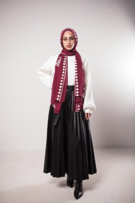 full body shot of hijabi model in EMMA Scarf Love me burgundy staring at camera